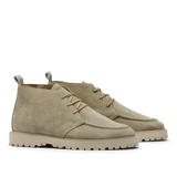 Introducing the Tan Beige Suede Leather Astra Boots by CQP, a pair of contemporary chukka boots crafted from beige suede with tan laces, a supportive rubber sole, and a convenient pull tab on the back.