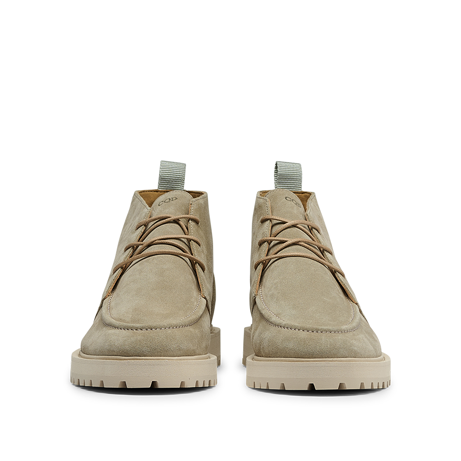 The Tan Beige Suede Leather Astra Boots by CQP are a pair of contemporary chukka boots made from the finest suede upper, featuring supportive thick rubber soles and laces, viewed from the front.