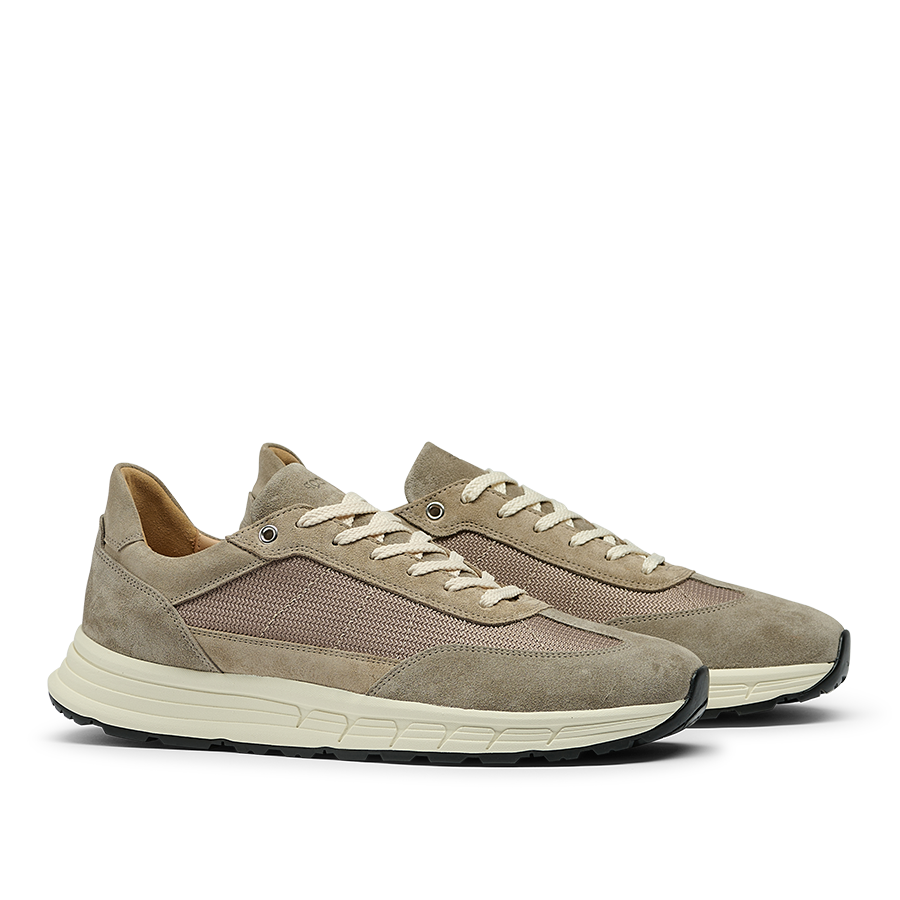 A pair of Taupe Suede Leather Renna Mesh Sneakers by CQP, featuring a beige and brown lace-up design crafted from premium materials, with white midsoles and black VIBRAM outsoles.