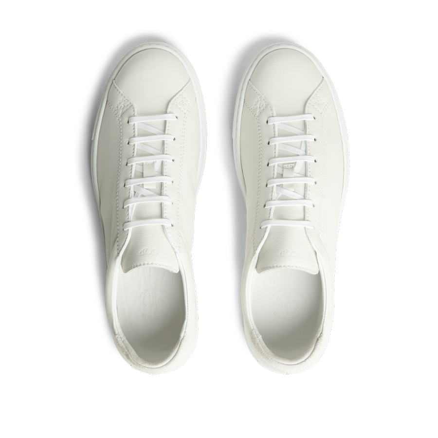 A pair of White Leather Racquet sneakers by CQP.