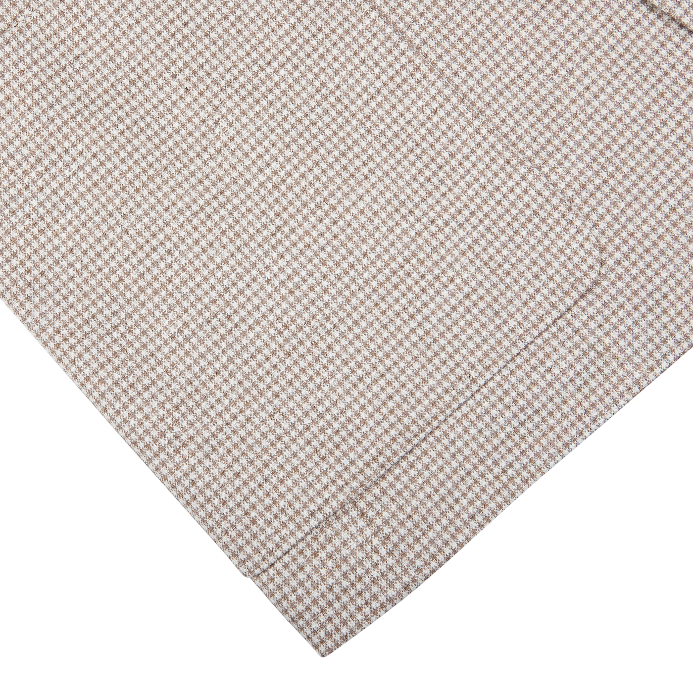 Close-up of a beige houndstooth Canali cotton jersey blazer fabric with a folded corner against a white background.