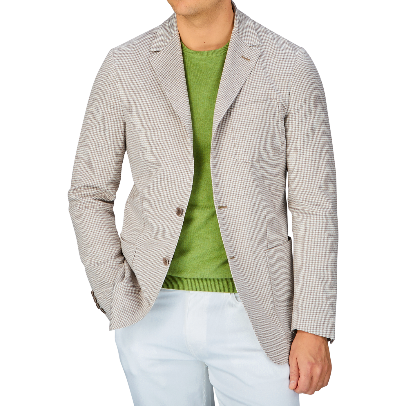 Man wearing a Canali Beige Houndstooth Cotton Jersey Blazer, green t-shirt, and white pants.