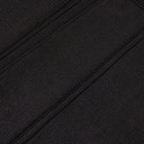 A close up image of a Canali black suitcase with pure silk lining.