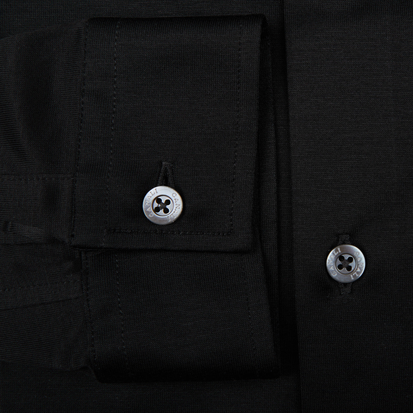 A contemporary man's black cotton jersey casual shirt by Canali, featuring buttons.