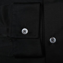 A contemporary man's black cotton jersey casual shirt by Canali, featuring buttons.