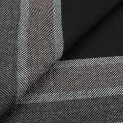 Close-up of a pure wool textile featuring a black, gray, and white plaid pattern, evocative of the Canali Black Grey Striped Wool Scarf.