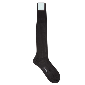 A pair of black knee length silk dress socks on a white background by Canali.