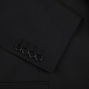 A classic, timeless close up of a Canali Black Virgin Wool Twill Suit with buttons.