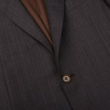 A close up of a Canali Blue Brown Melange Striped Wool Suit with brown buttons made of virgin wool.