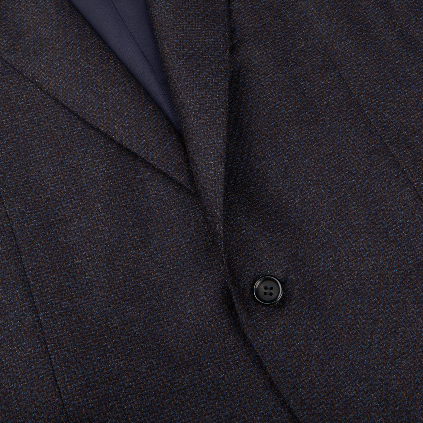 A close up of a dark blue Canali Blue Brown Zig Zag Wool Drop 6 Blazer suit.