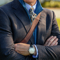 A man in a Canali Blue Brown Zig Zag Wool Drop 6 Blazer with his arms crossed.