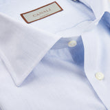 A close up of an elegant Canali Blue Mini-Check Cotton Single Cuff Shirt, handmade in Italy.