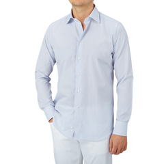 A man wearing a Canali Blue Mini-Check Cotton Single Cuff Shirt.