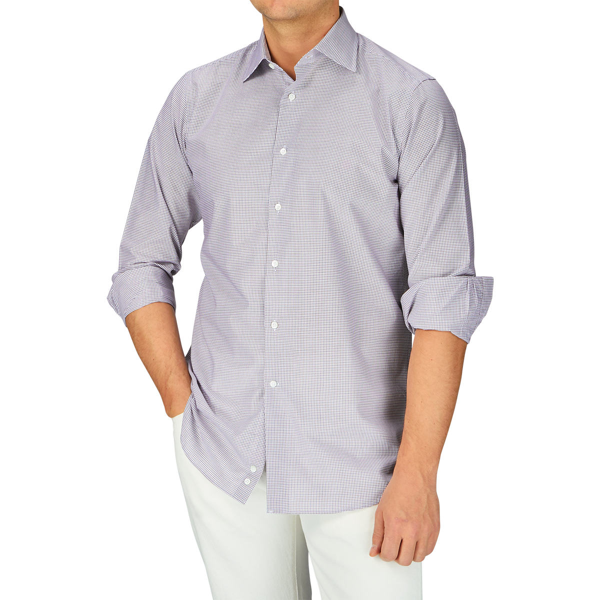 A man wearing a purple Canali shirt and white pants.