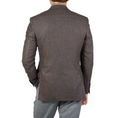 The back view of a man wearing a Canali Brown Grey Zig Zag Wool Drop 6 Blazer.