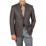A man is posing in a brown Grey Zig Zag Wool Drop 6 Canali Blazer.