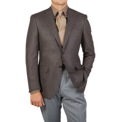 A man is posing in a brown Grey Zig Zag Wool Drop 6 Canali Blazer.