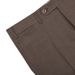 Close-up of Canali Brown Matte Wool Flat Front Trousers featuring a button and belt loops on a white background.