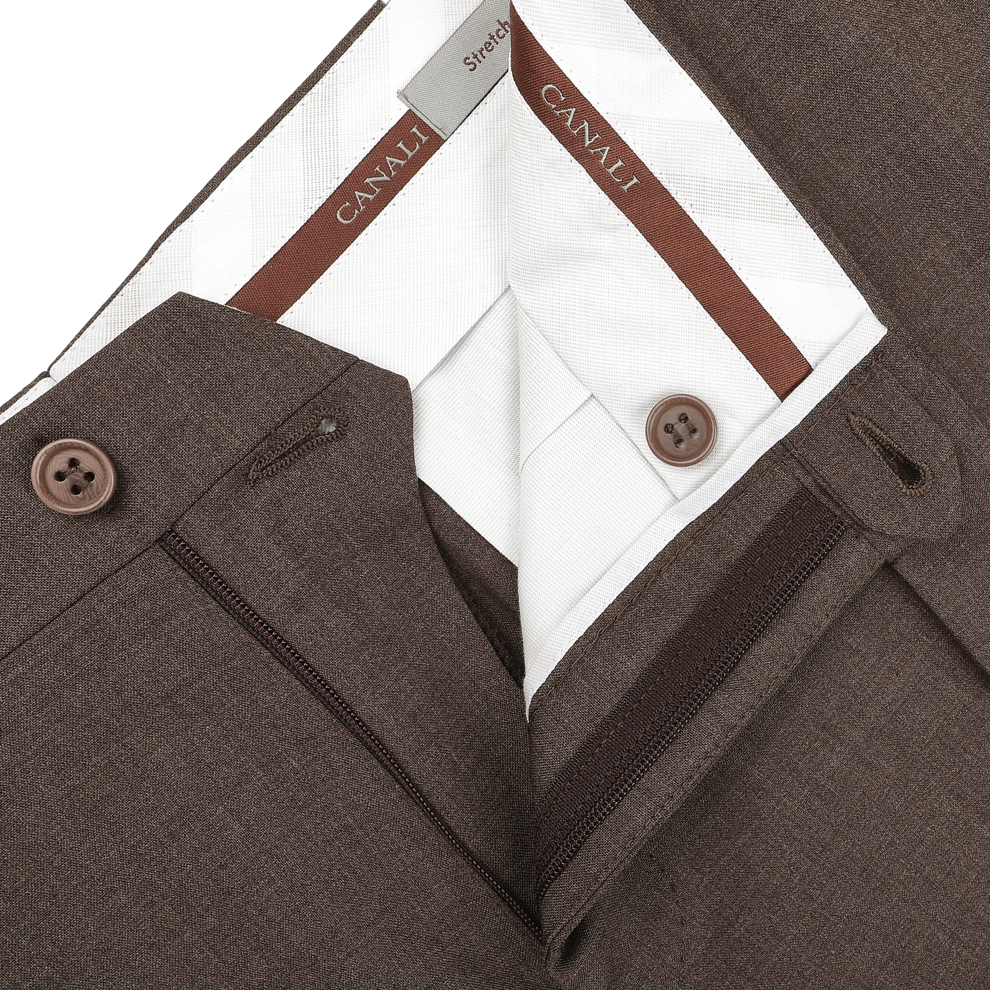 Close-up of tailored Canali Brown Matte Wool Flat Front Trousers, featuring zipper and black button detail, highlighting the interior label and meticulous stitching.