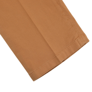 A pair of Canali Terracotta Cotton Stretch Flat Front Chinos on a white background.