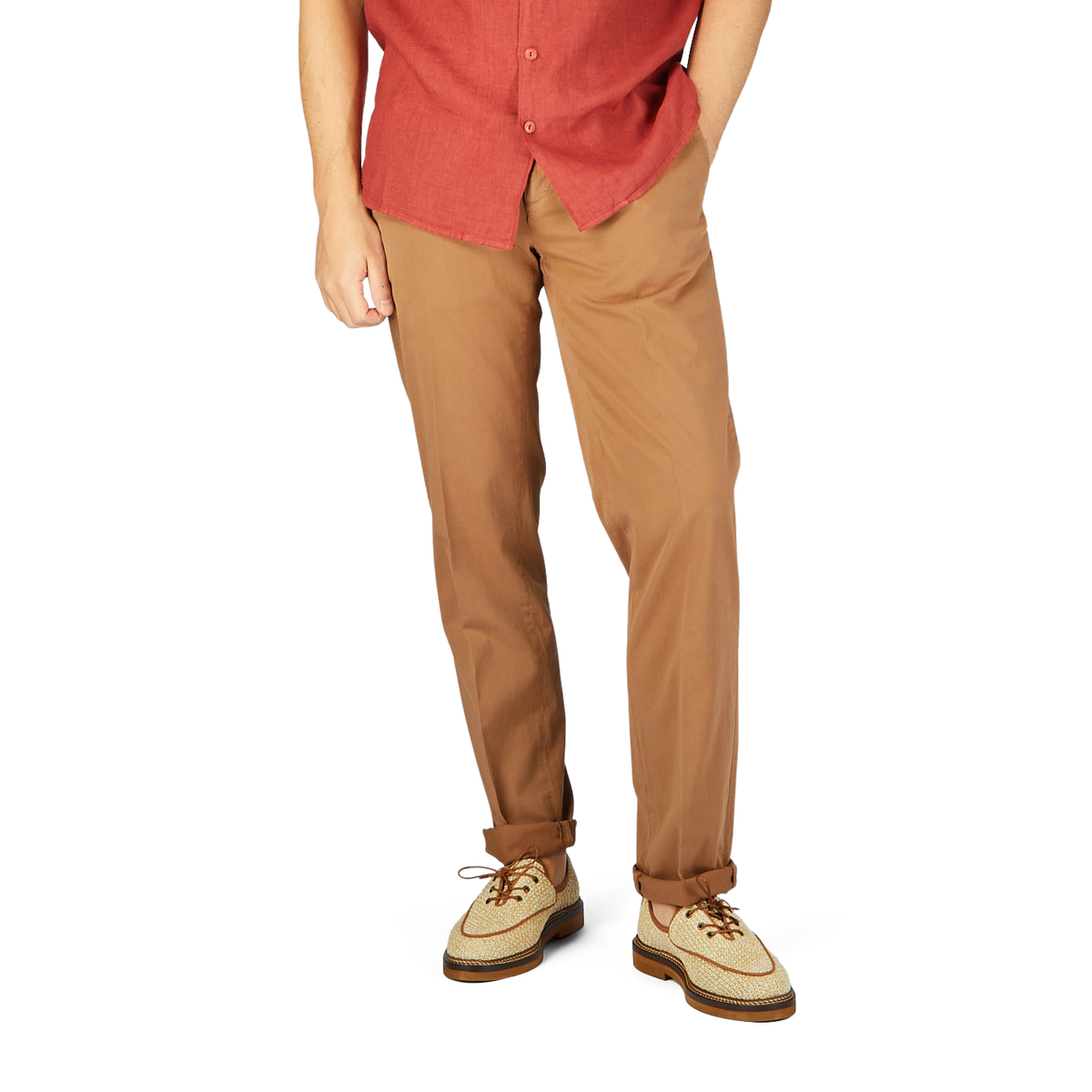 A man in a red shirt and Canali terracotta cotton stretch flat front chinos.