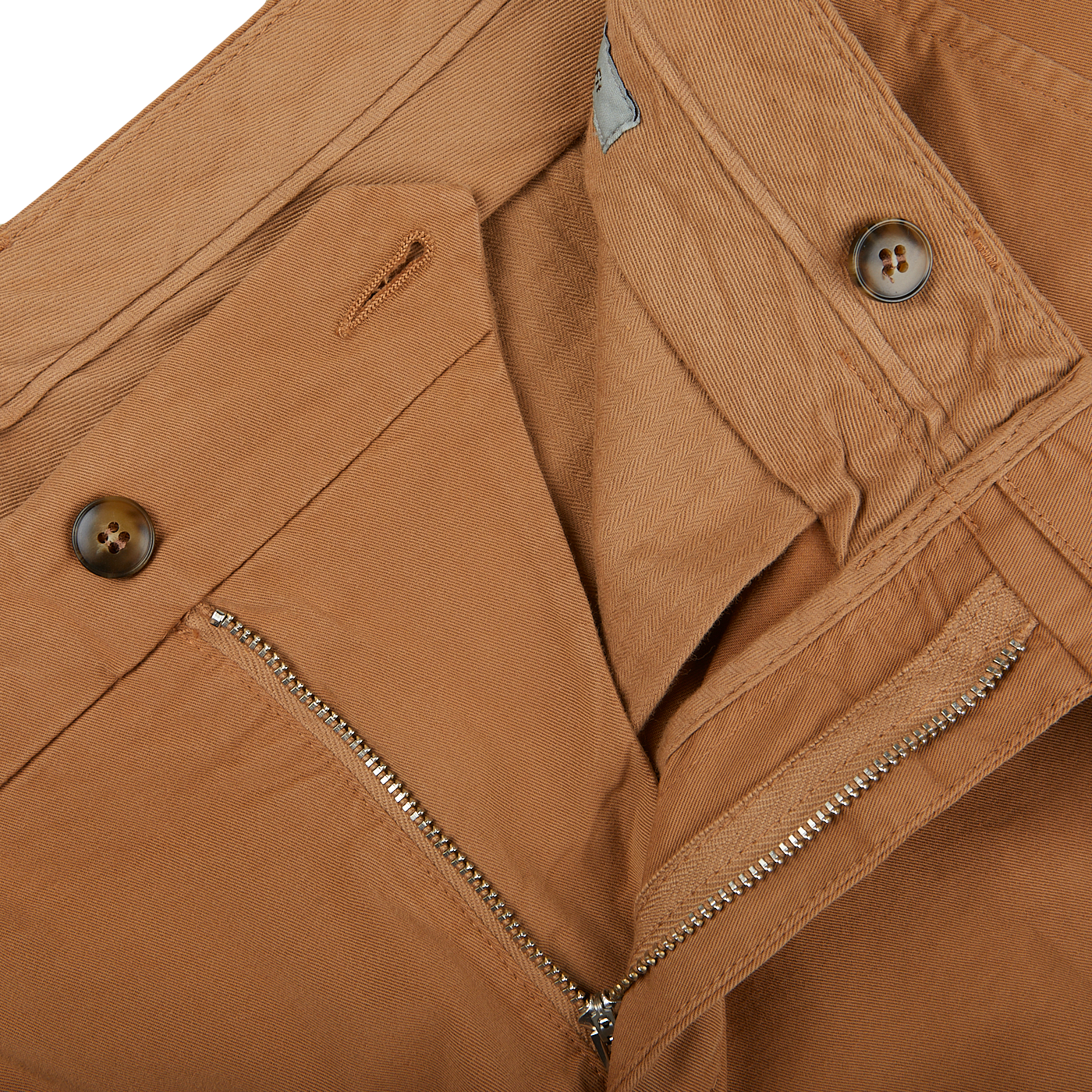 A close up of a pair of Canali Terracotta Cotton Stretch Flat Front Chinos with zippers, showcasing their distressed appearance.