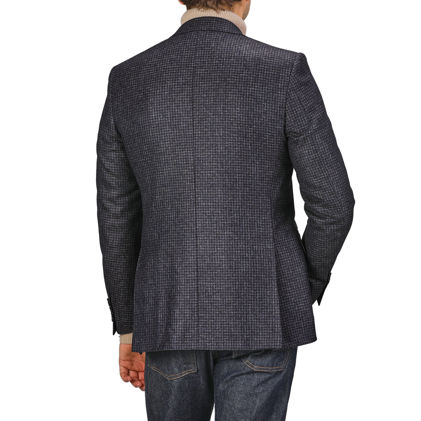 A person facing away, clad in the Canali Dark Blue Checked Wool Drop 6 Blazer, paired with jeans.