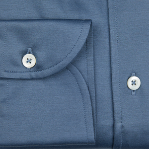 A close up of a Canali dark blue cotton jersey casual shirt, suitable for modern-day working life.
