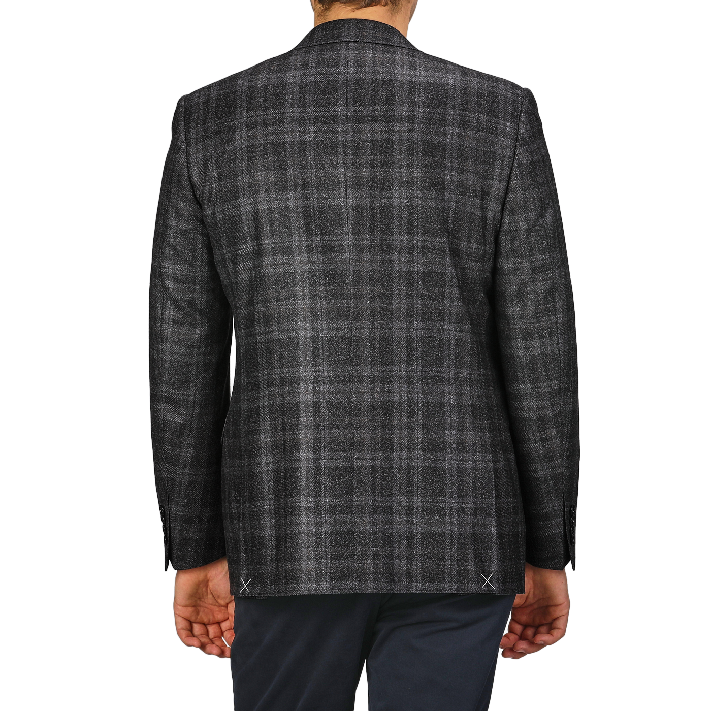 The man is dressed in a Canali Dark Grey Checked Wool Silk Drop 6 Blazer, radiating Milanese style as he stands against a plain background, viewed from the back.