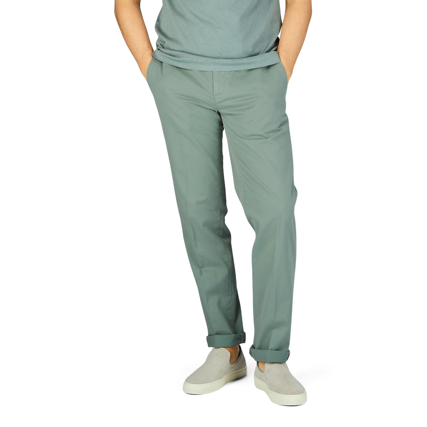 A man wearing Sage Green Cotton Stretch Flat Front Chinos from Canali and a white cotton shirt.