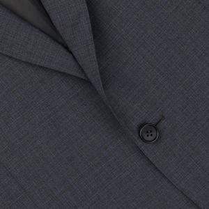 Close-up of a Canali Grey-Blue Melange Wool Suit jacket focusing on the texture, lapel, and a button.
