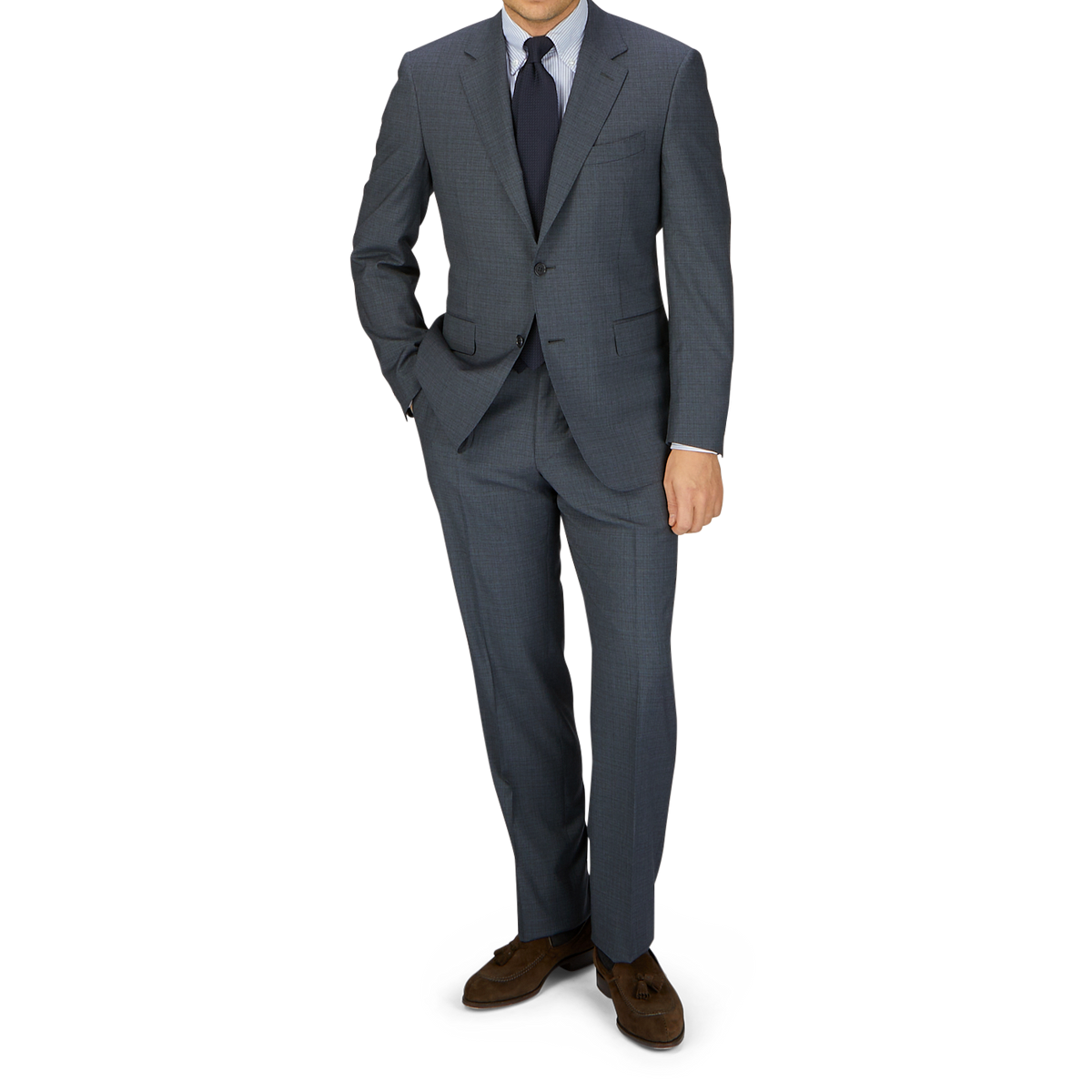 A man in a tailored Canali Grey-Blue Melange Wool Suit, white shirt, and blue tie stands with his left hand in his pocket, against a light gray background.