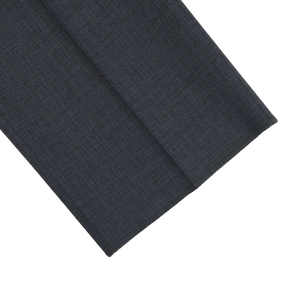 A traditional Canali tailored dark blue suit with a checkered pattern, made from high-quality Grey Blue Melange Checked Wool Trousers.