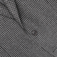 Close-up of the Canali Grey Dogtooth Wool Drop 6 Blazer, featuring a houndstooth pattern in pure wool with a single visible button.