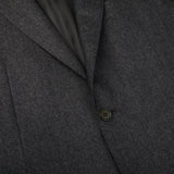 A close up of a Canali Grey Melange Wool Flannel Suit with buttons.
