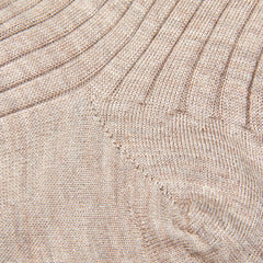 A close up of a pair of Canali Light Beige Cashmere Silk Ribbed Socks.