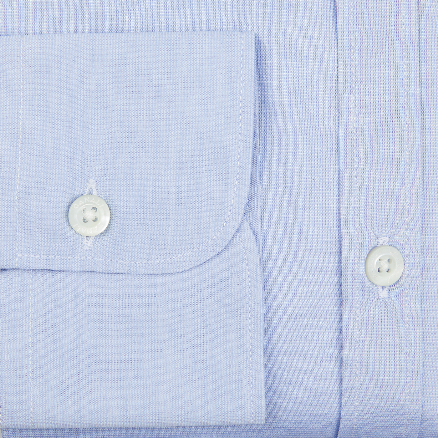 A Light Blue Cotton Jersey Casual Shirt with white buttons is a contemporary option for the Canali man.