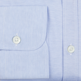 A Light Blue Cotton Jersey Casual Shirt with white buttons is a contemporary option for the Canali man.