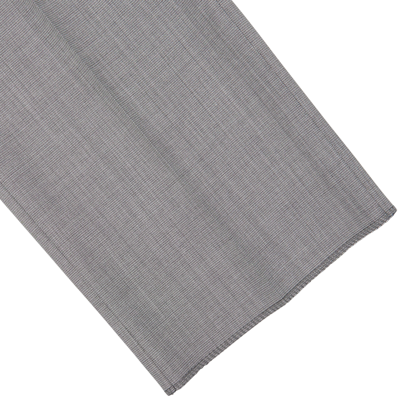 Gray fabric with a herringbone pattern laid flat on a white surface, embodying classic sartorial elegance- Canali Light Grey Micro Check Wool Suit.