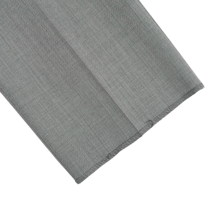 A pair of Canali Light Grey Micro Check Wool Trousers on a white surface.