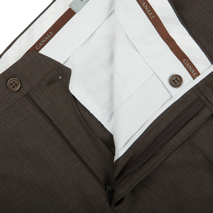 A close up of a tailored Canali Matte Brown Wool Stretch Flat Front Trouser.