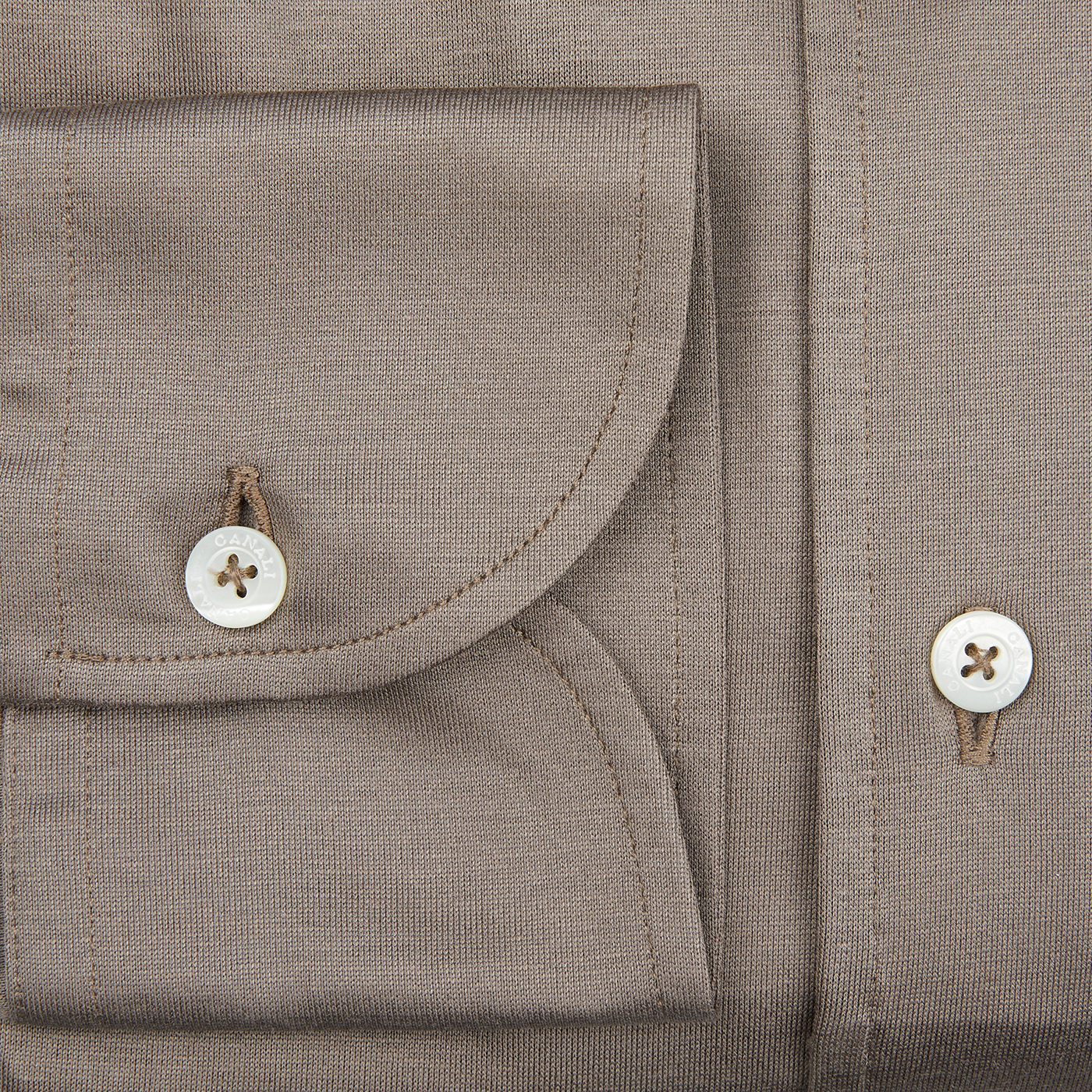A close up of a Canali Mushroom Brown Cotton Jersey Casual Shirt with buttons, perfect for the contemporary man.