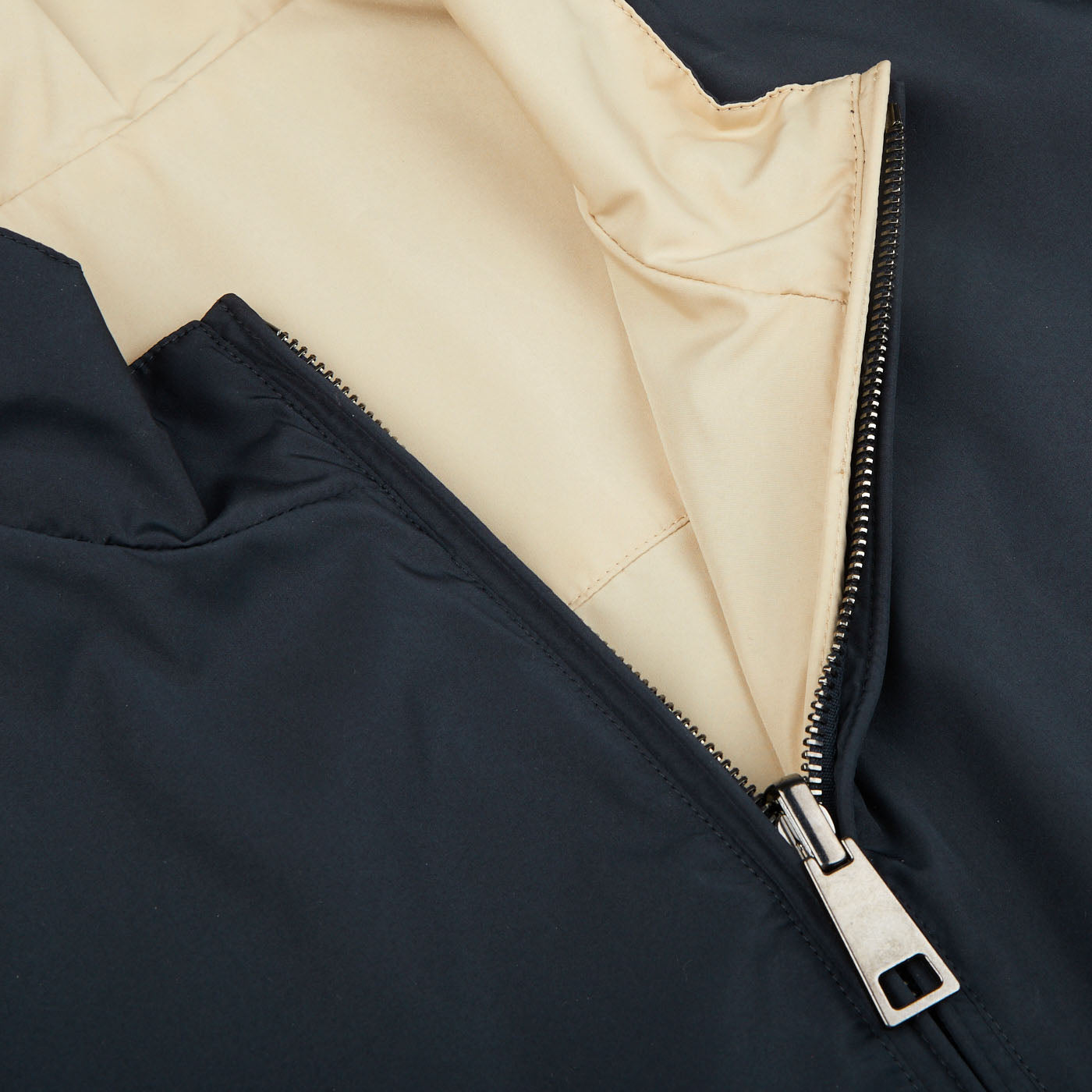 A Navy Blue Beige Reversible Technical Gilet by Canali with a technical zipper.