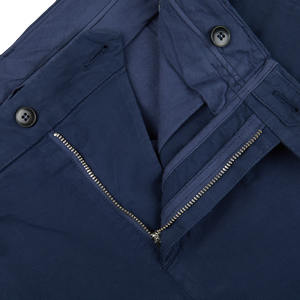 A close up of a Canali Navy Blue Cotton Stretch Flat Front Chinos with zippers.