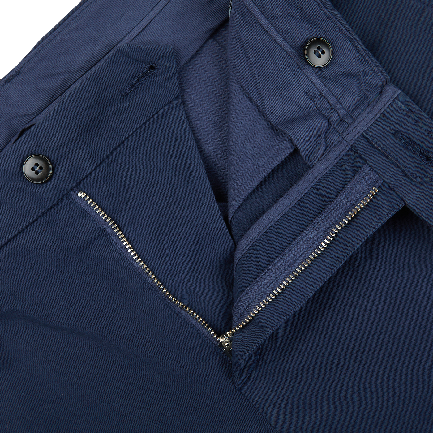 A close up of a Canali Navy Blue Cotton Stretch Flat Front Chinos with zippers.