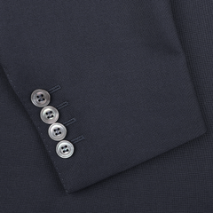 Close-up of a Canali Navy Blue Hopsack Wool Blazer sleeve, featuring four silver buttons.