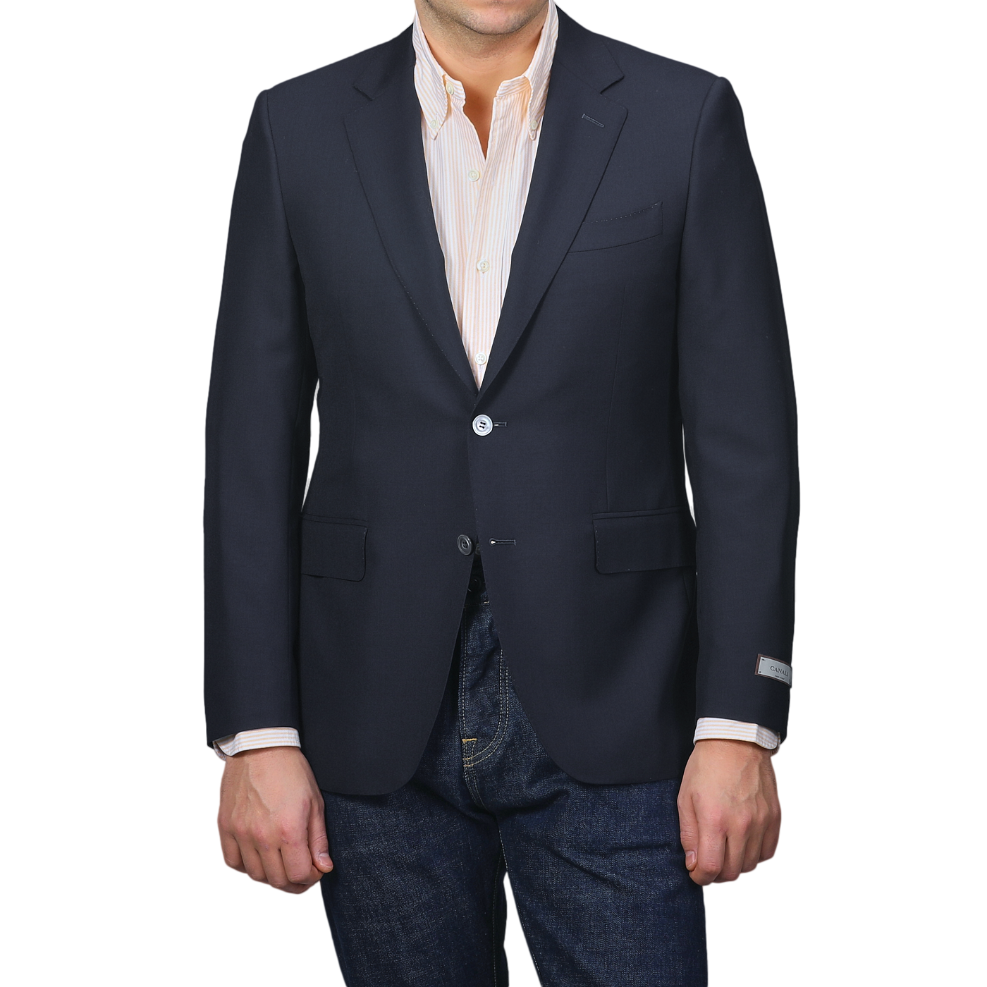 A person dons the Canali Navy Blue Hopsack Wool Blazer, paired with a light striped shirt and blue jeans. The blazer, stylishly detailed with pockets and buttons, captures a refined Milanese essence.