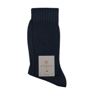 A pair of Navy Blue Knee Long Ribbed Cotton Socks made from Egyptian cotton with the words Canali on them.