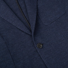 A close up of a Canali Navy Blue Melange Wool Jersey Jacket with casual tailoring.