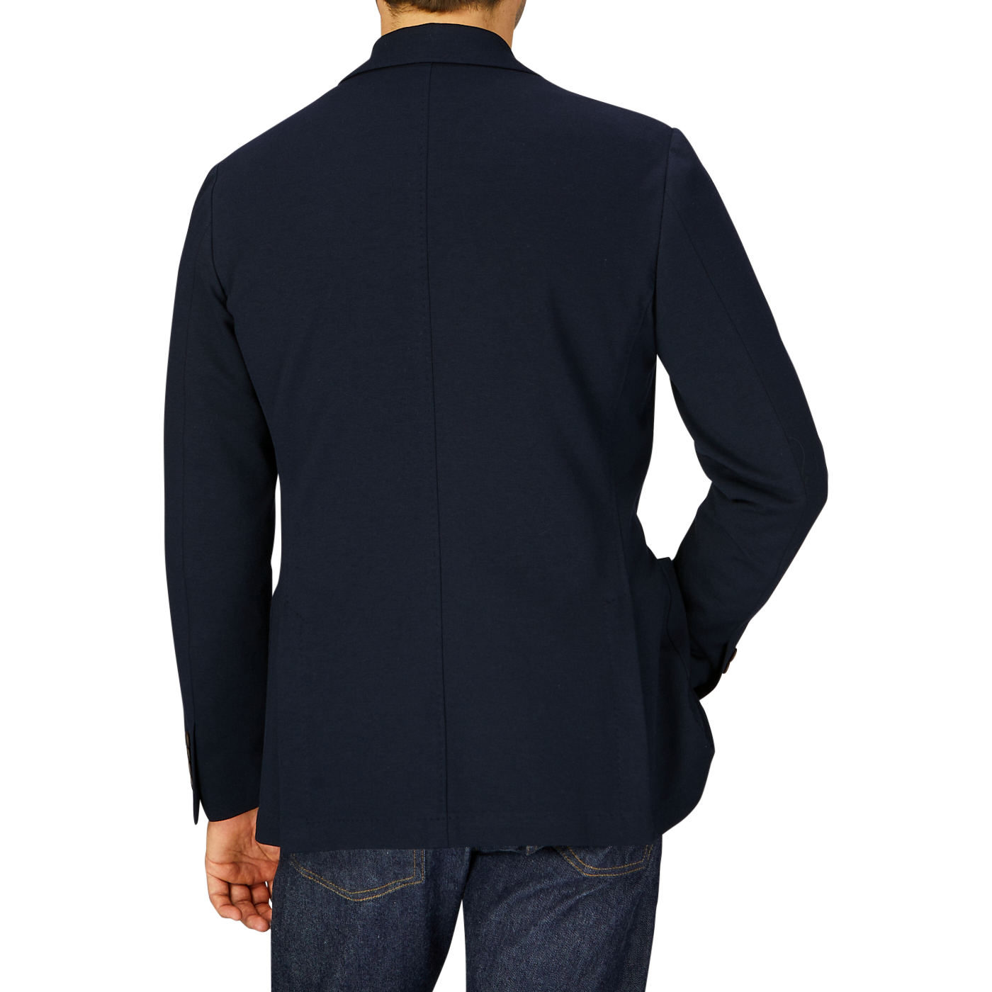 Man from behind wearing a Canali navy cotton jersey unconstructed blazer crafted with casual tailoring and denim jeans.